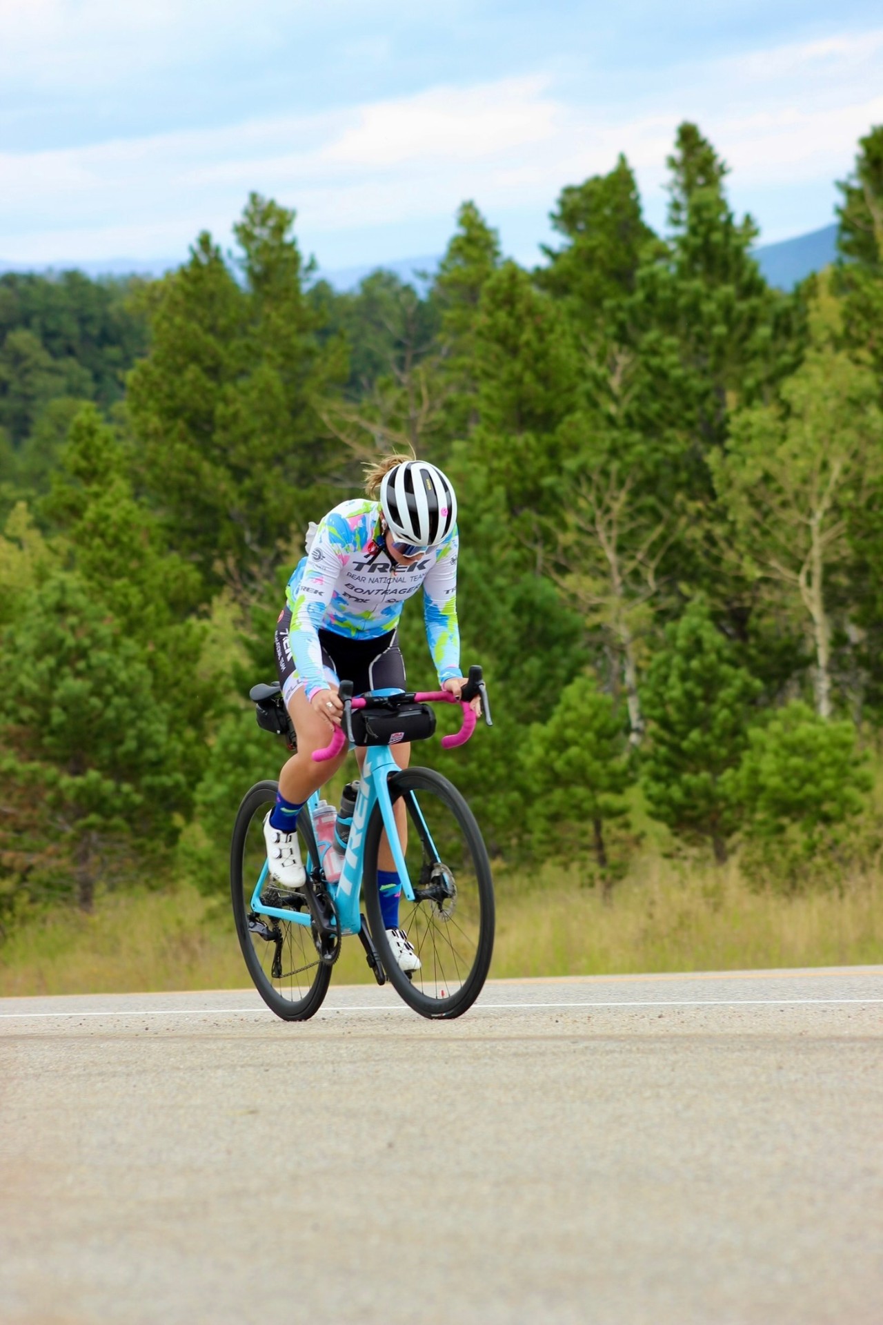 Bayli climbing on the Trek Émonda in Bear National Team kit