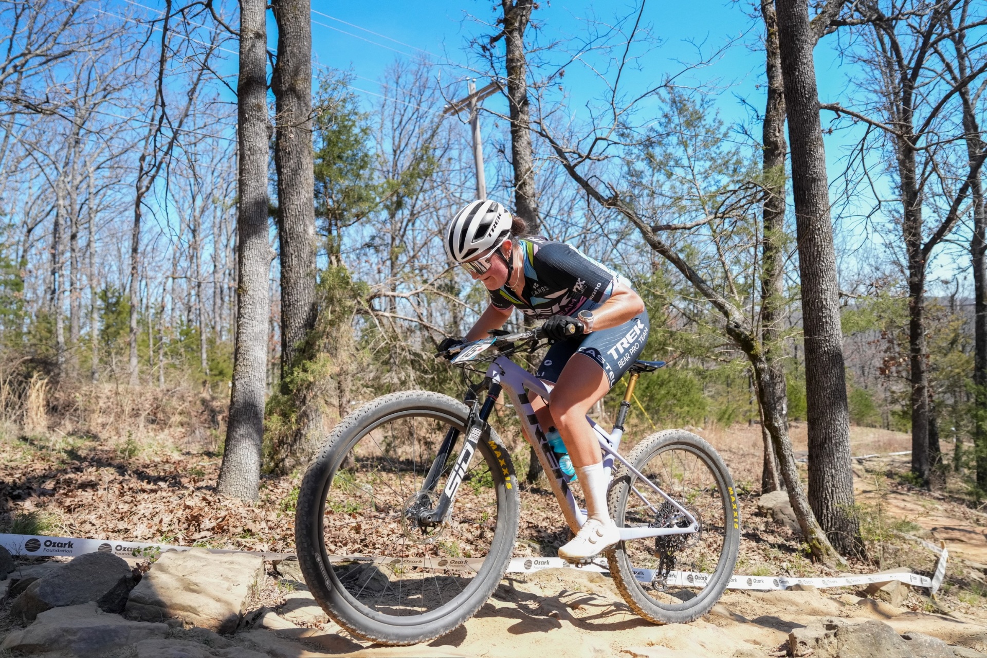 Bayli racing in Trek Bear Pro kit through the Ozarks