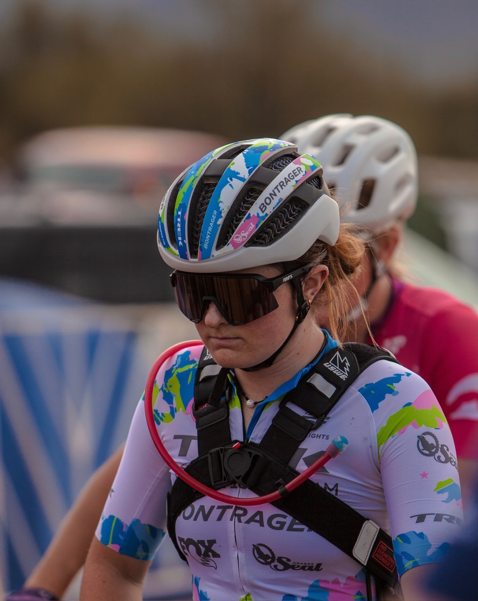 Bayli on the start line in Trek Bear Pro helmet and Orange Seal kit