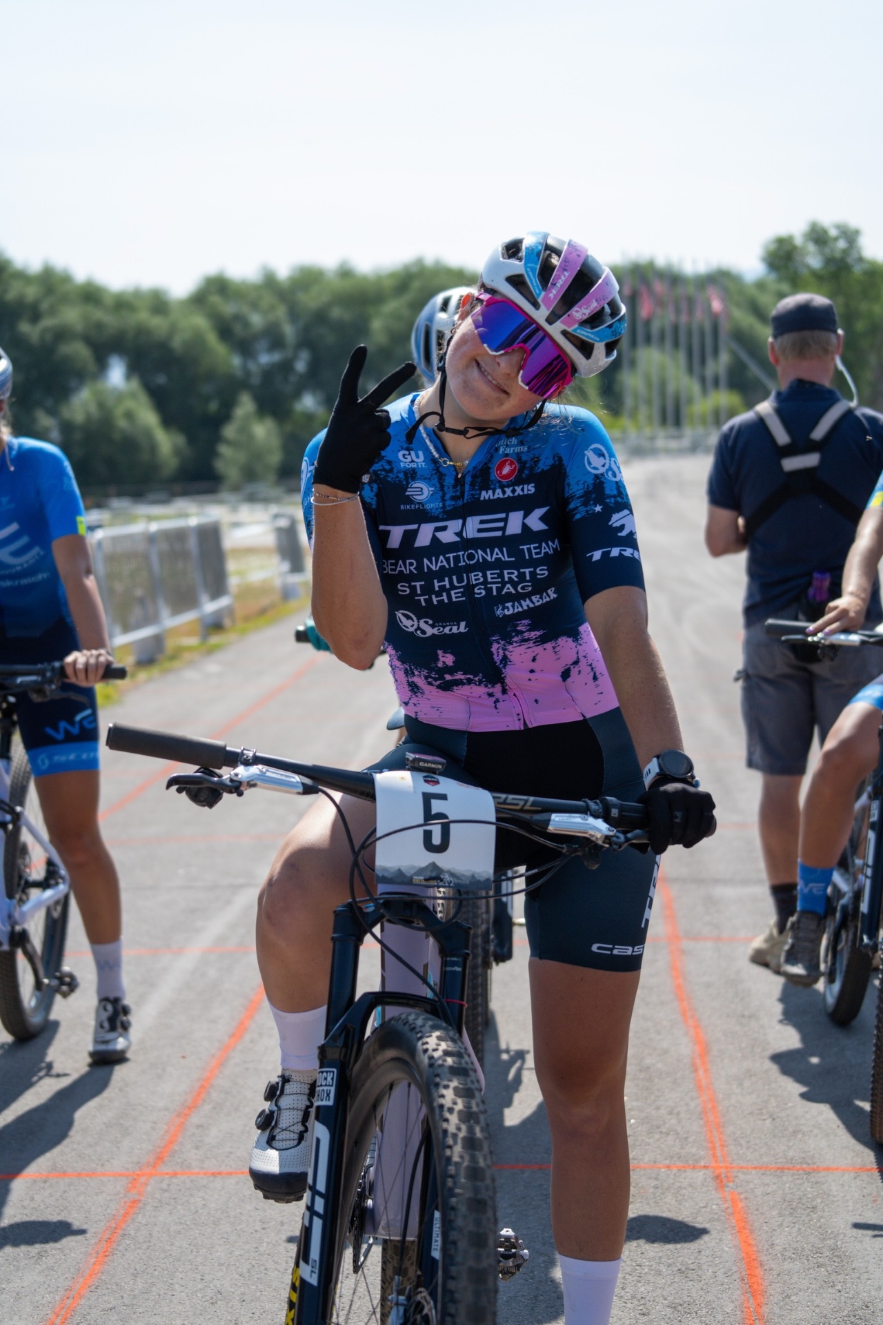 Bayli #5 flashing a peace sign on the start line at a US Pro XCT