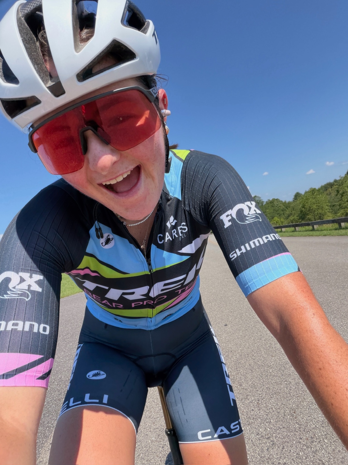 Bayli grinning on a road ride selfie in Trek Bear Pro Team kit